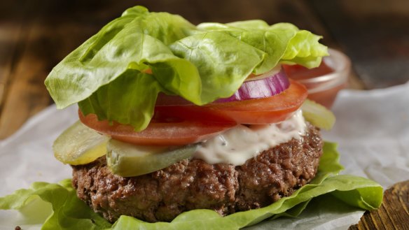 Lettuce burgers, swapping the buns for lettuce, with onions, a large beef patty and lots of mayonnaise and pickles.