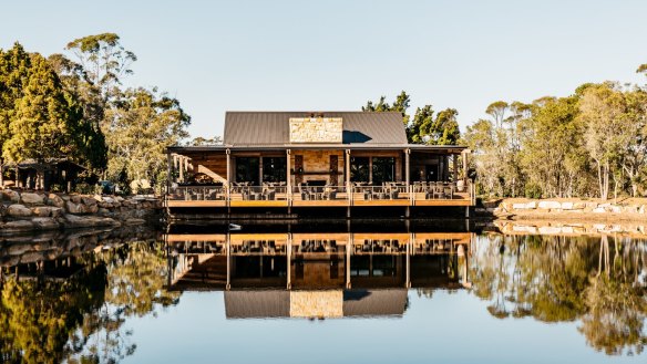 Waterside dining: The sandstone homestead is perched on a dam. 