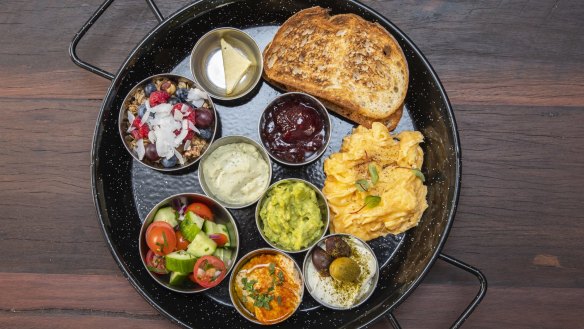 Israeli breakfast with scrambled eggs. 