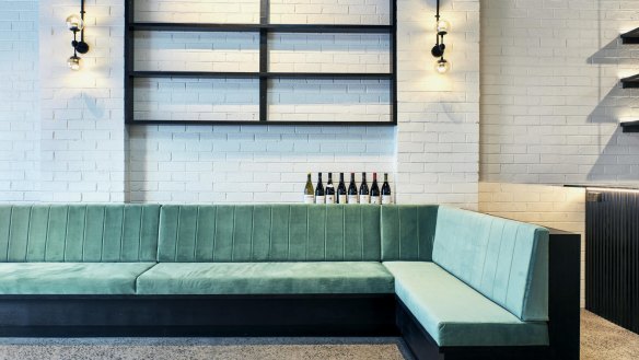 Bar Romanee's interior takes its cues from the green Italian marble bar.