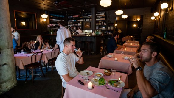 Pink tablecloths adorn the Potts Point venue.