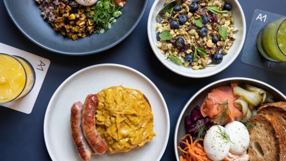 A breakfast spread at A1 Canteen in Chippendale, including curried scrambled egg and LP's sausages on an English muffin.