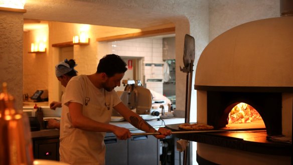 The wood-fired pizza oven takes pride of place.