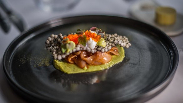 Kingfish escabeche looks like an elegant clam perched atop a bed of avocado puree