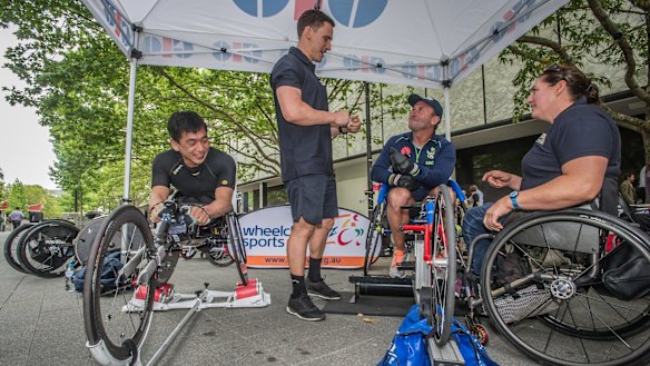Five-time Paralympian Angie Ballard gives Raiders coach Ricky Stuart ...