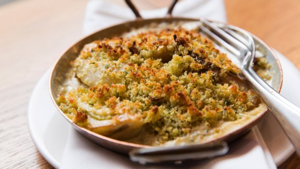 Fennel baked with milk and toasted breadcrumbs. 