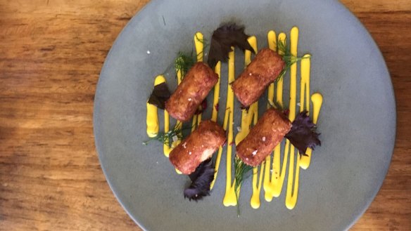 Smoked haddock and gruyere croquettes with saffron sauce at Cupitt's Kitchen.
