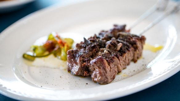 Every meal at Lola's should include a skewer threaded with finely sliced and spiced lamb.
