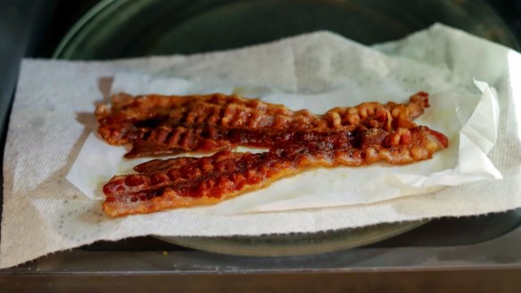 Yes, you can cook bacon in a microwave.