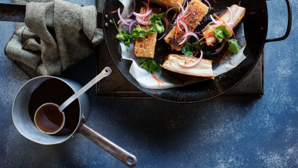Crispy-skin pork belly slow cooked in master stock with three-flavour sauce.