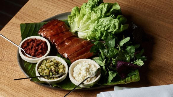 Babi guling (roasted suckling pig with sambals and fresh herbs) at Aru, Melbourne. 