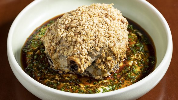 Lamb shoulder with almond sauce, anchovy, parmesan and pine nuts.