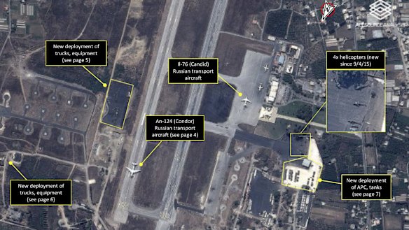 A satellite image shows Russian transport aircraft, helicopters, tanks, trucks and armed personnel carriers at an air base in Latakia in Syria.