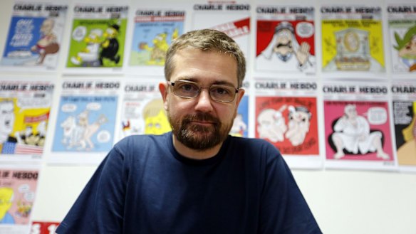 Killed by gunmen ... Charlie Hebdo's publisher and editor Stephane Charbonnier in 2012. A 24-year-old man faced trial for allegedly threatening to behead Charbonnier in September, 2012.