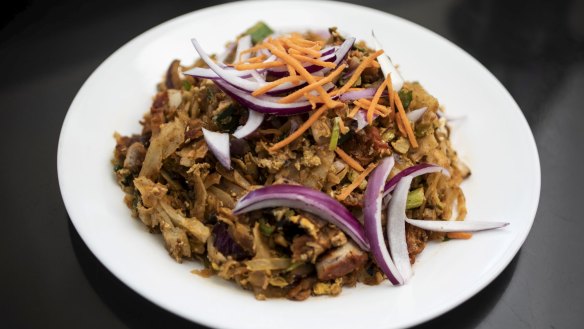 Kotthu roti, a mixture of chopped roti, egg, meat, vegetables and spices.