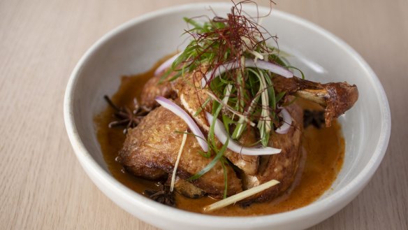 Go-to dish: Crisp-skin corn-fed master-stock chicken with ginger, chilli and satay sauce.