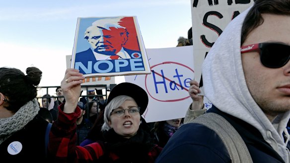 Protesters march in Chicago before a rally with Republican presidential candidate Donald Trump.