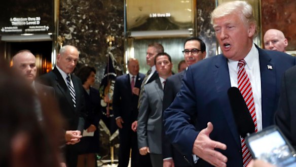 US President Donald Trump doubles down on blaming "all sides" for the Charlottesville violence in off-script remarks in the lobby of Trump Tower on Tuesday.