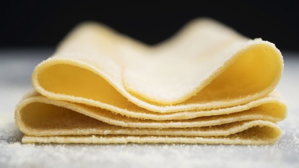 Pasta dough made from scratch, folded into layers and ready to cut by hand into noodles, in New York, March 21, 2017. Making pasta from scratch is the ultimate exercise in instinctual cooking. (Karsten Moran/The New York Times) Samin Nosrat pasta recipe feature. Good Food use only. SINGLE USE ONLY. Images downloaded during NYT Cooking trial Jan-Feb 2020. Must credit Karsten Moran/The New York Times