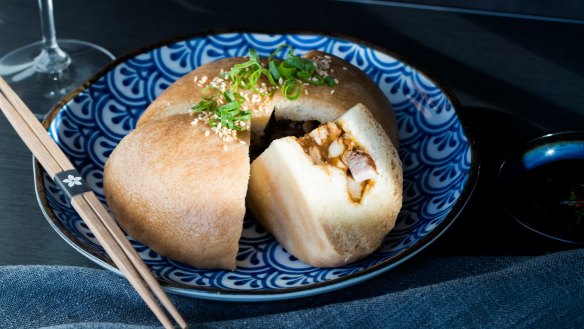 The giant pork bun, stuffed with a chunky mix of belly pork, chestnuts and mustard greens.