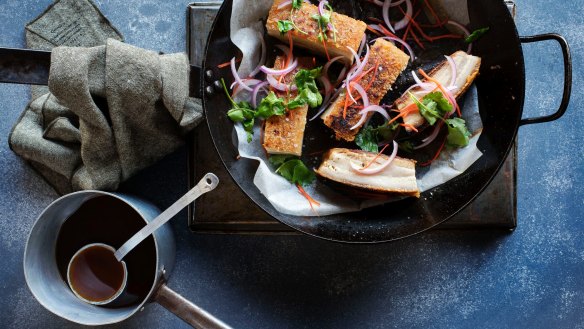 Crispy-skin pork belly slow cooked in master stock with three-flavour sauce.