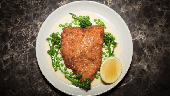 Chicken cotoletta, peas, broccolini and lemon parmesan cream.