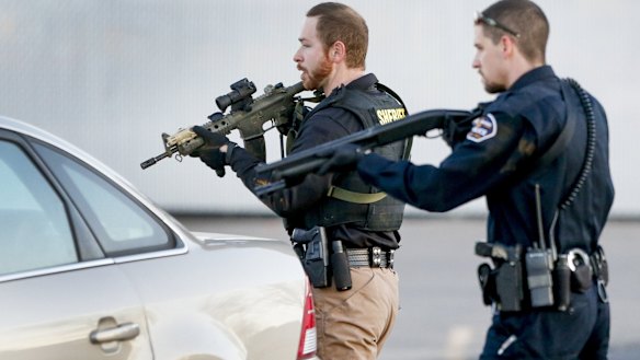 Police look for a possible second shooter in the parking lot of  Excel Industries.