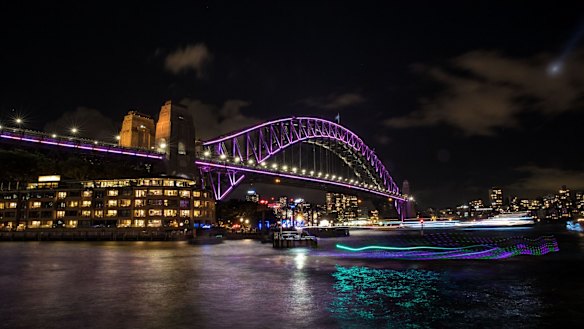 The Sydney Harbour Bridge lights up for Vivid