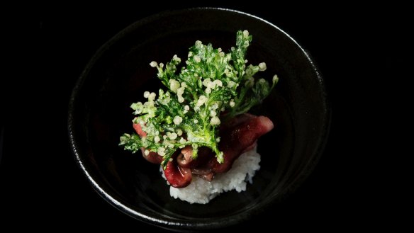 Char-grilled David Blackmore wagyu, sushi rice and shungiku tempura.