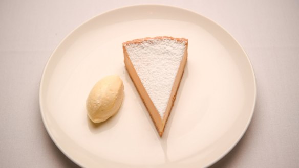 Lemon tart with buttery crust and sharp curd.