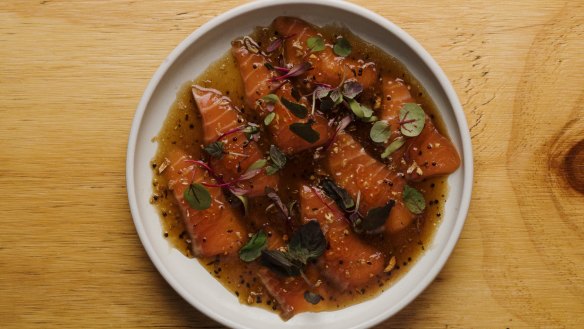 Salmon sashimi is offered with a Vietnamese twist.