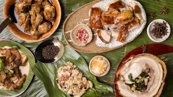 Assorted dishes from Sydney Cebu Lechon including suckling pork (centre).