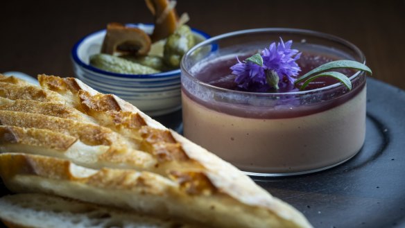 Duck liver parfait served with crusty baguette is a dream of silken rich meatiness.