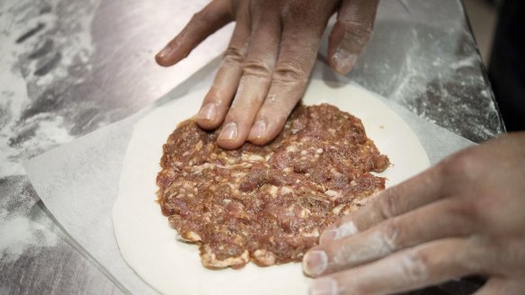 Spread a portion of the filling evenly over a pancake, then cover with another pancake.