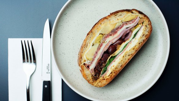 Muffaletta pressed baguette sandwich at A1 Canteen.