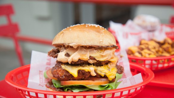 The Southern Cali with double US cheese, lettuce, bourbon bacon jam, tomato and chipotle mayo at Mocha Jo's Burger Bar, Ripponlea, Melbourne.