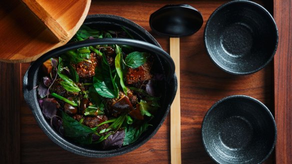 Spice-crusted beef intercostal with snake beans, pickled shiitake and fresh herbs.