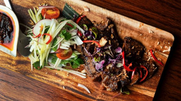 12-hour-smoked Rangers Valley wagyu brisket with green papaya salad and burnt chilli.