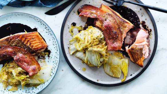 Roast salmon with red wine sauce and braised cabbage.  