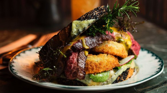 Go-to dish: Oakey Reserve flank steak sandwich with aged cheddar, onion rings and radish salad.