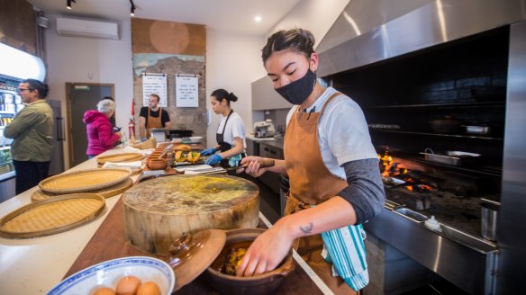 Ca Com Banh Mi Bar features an open hearth.