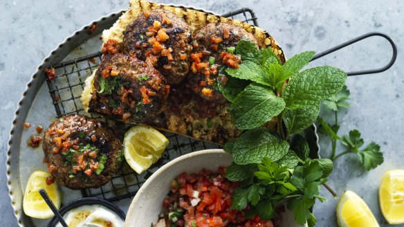 Lamb and capsicum burgers on Turkish tomatoes.