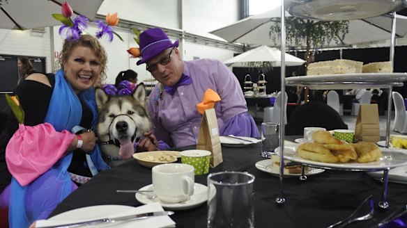 Kikka Happonen and Luigi Spagnolo with Yogi Bear at the A Pooch Affair high tea.