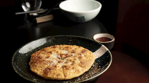 Cut into wedges and sprinkled with salt, Spice Temple's Northern Chinese-style lamb pancakes are a bonafide winner. 