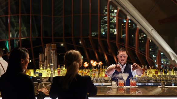 Pouring a drink at Bennelong bar.