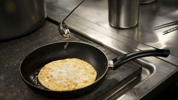 Pan-fry the pancakes until golden on both sides and the filling is cooked through, flipping them once.