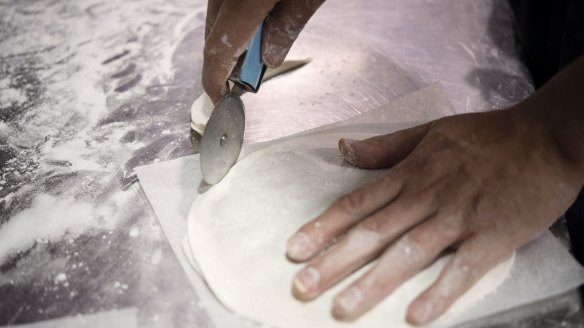 You can use a pizza cutter to trim the pancake to a perfect circle or leave the edges looking more organic.