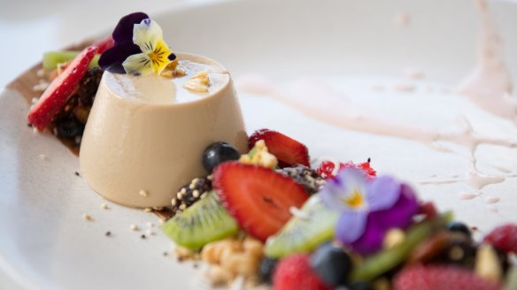 Espresso panna cotta with strawberry mousse, honeycomb crunch, fruit and muesli.