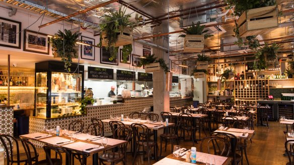 The Eat'aliano by Pino interior features hanging ferns.