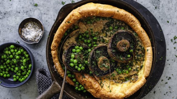 Giant Yorkshire pudding with roasted mushrooms and creamy mushroom sauce.